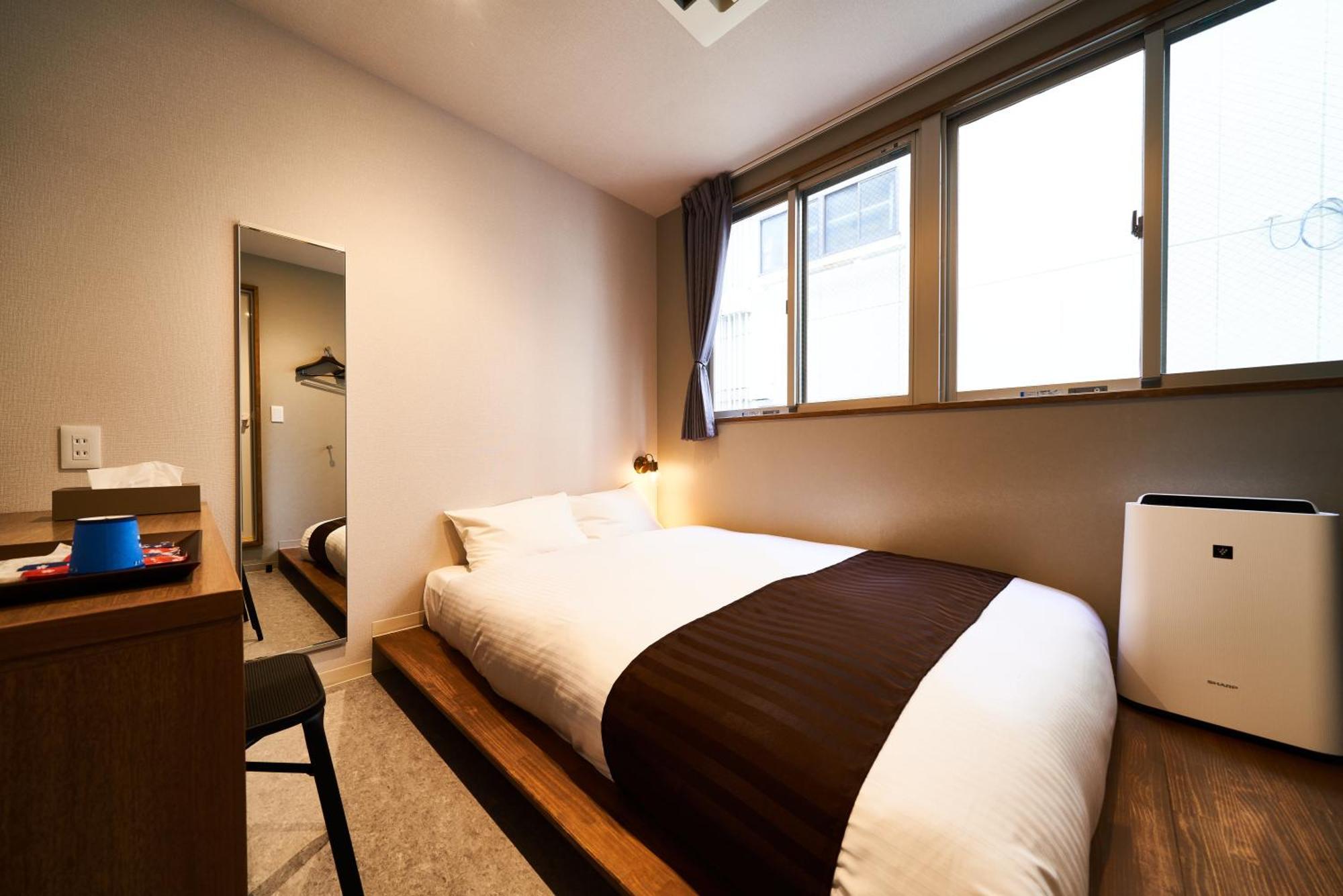 &And Hostel Shinsaibashi East أوساكا الغرفة الصورة